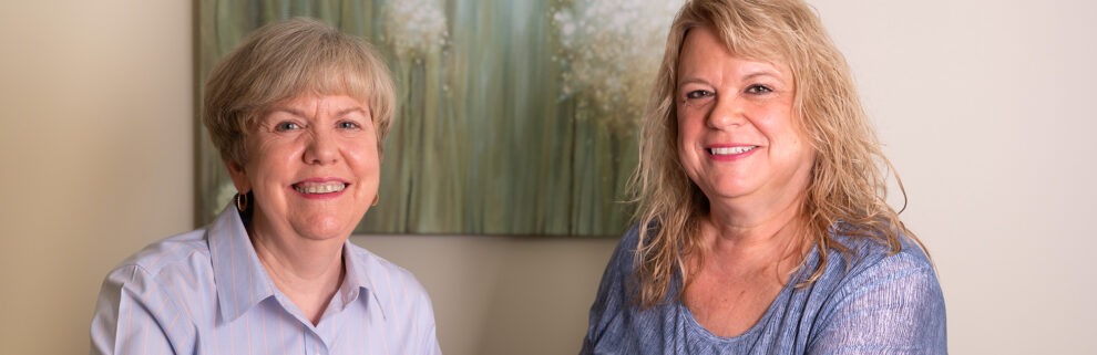 two women smiling