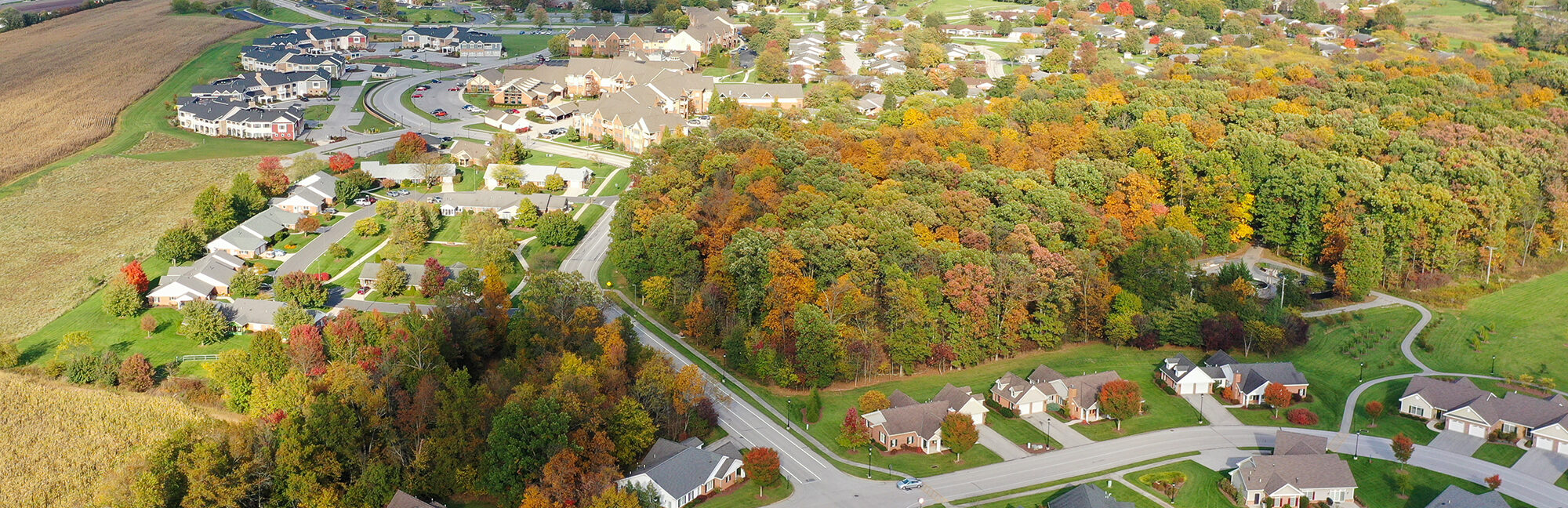 an aerial view of a cross keys retirement village surrounded by trees