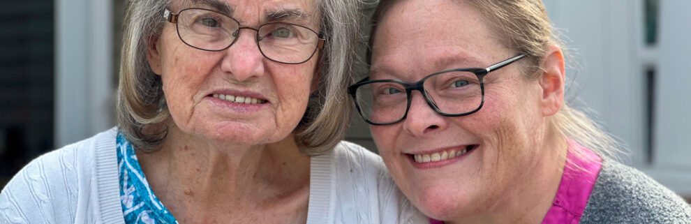 close up of two women smiling