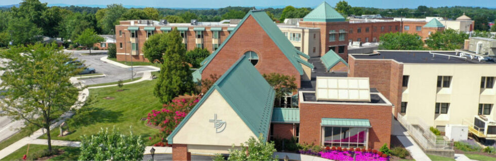 Aerial view of the outside of a Cross Keys Village complex